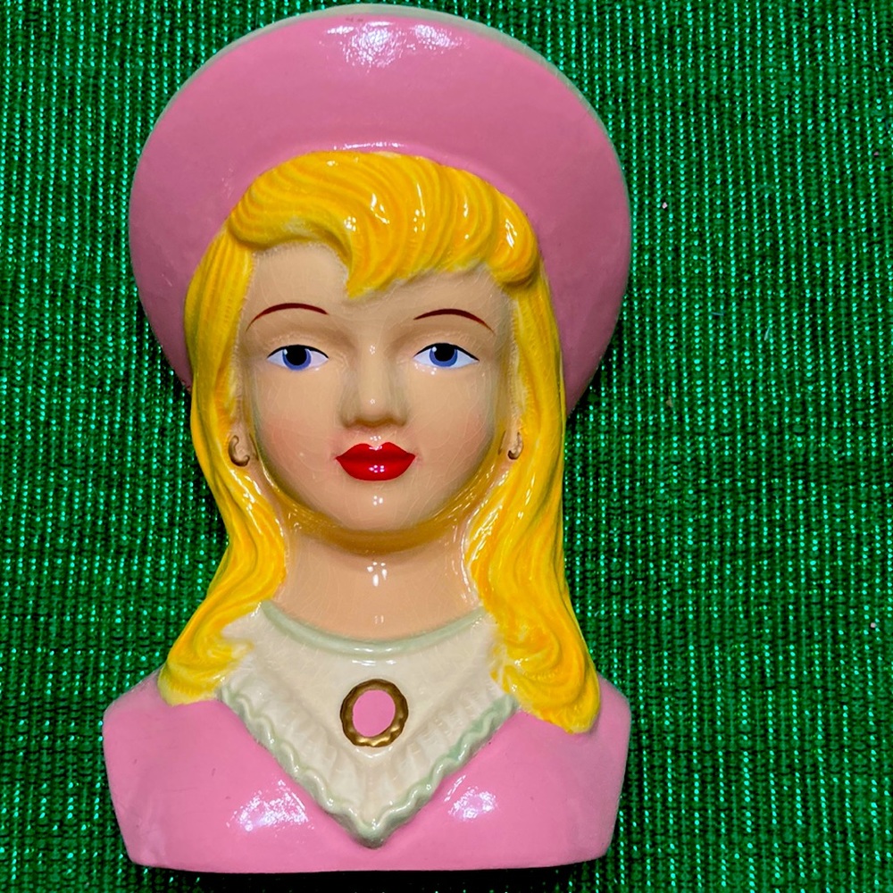 Lady head/pocket vase. 6” high 4”wide. found in storage from 2005 closed shop